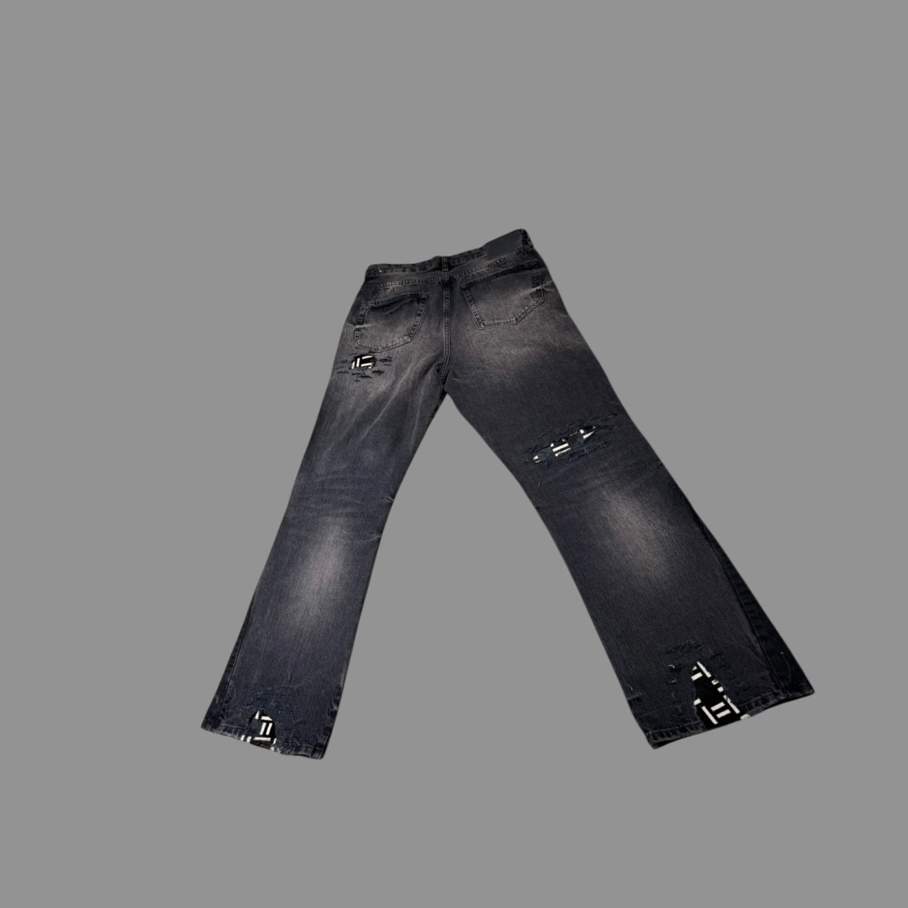 BLACK AND WHITE PONY HAIR PATCH FLARE DENIM