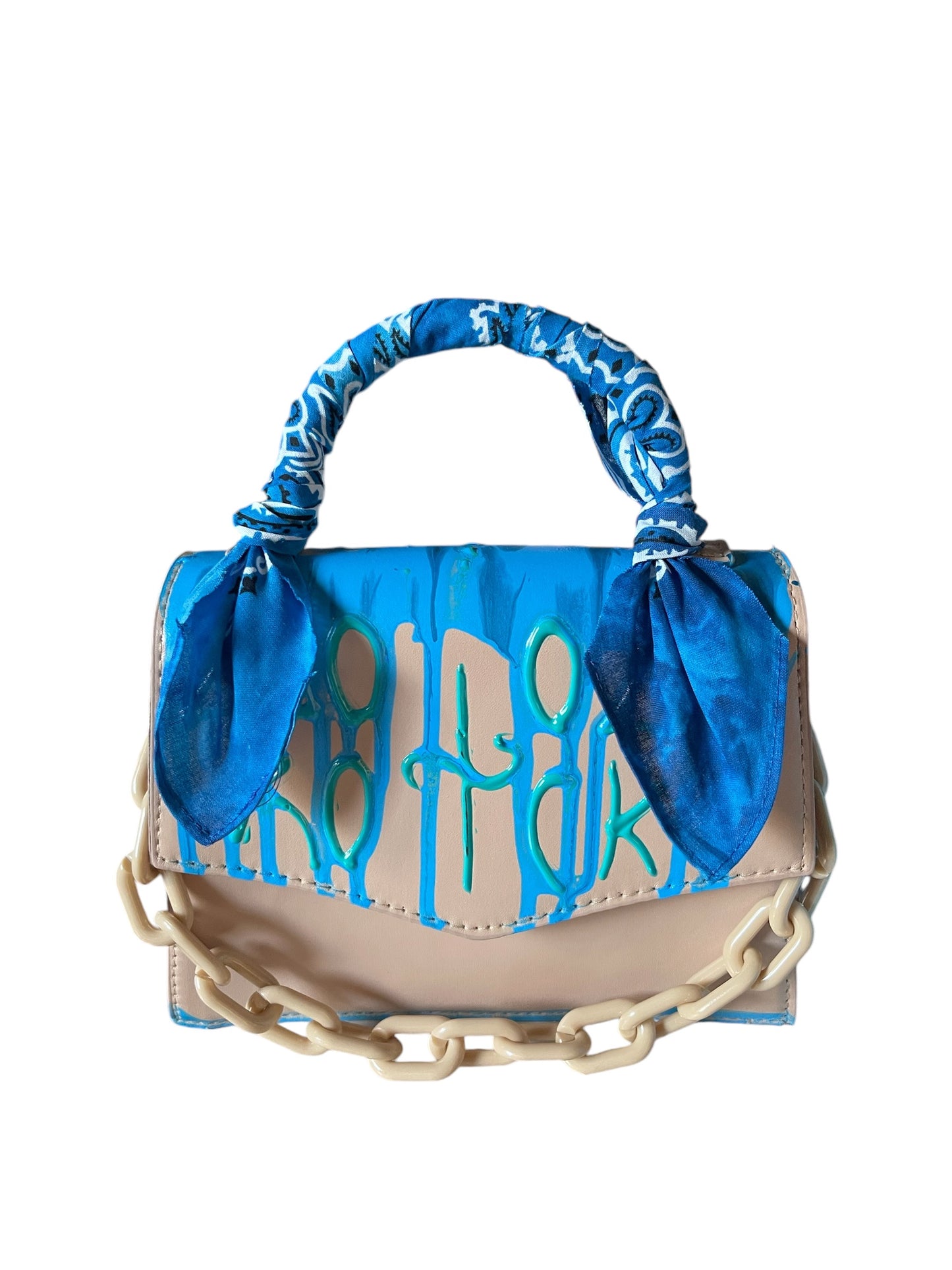 beige and blue bandana bag